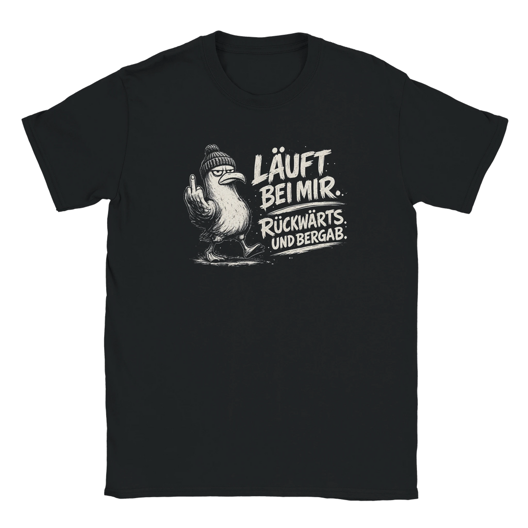 Produktfoto: Schwarzes T-Shirt mit Möwen-Aufdruck „Läuft bei mir. Rückwärts. Und bergab.“ freigestellt ohne Model.
