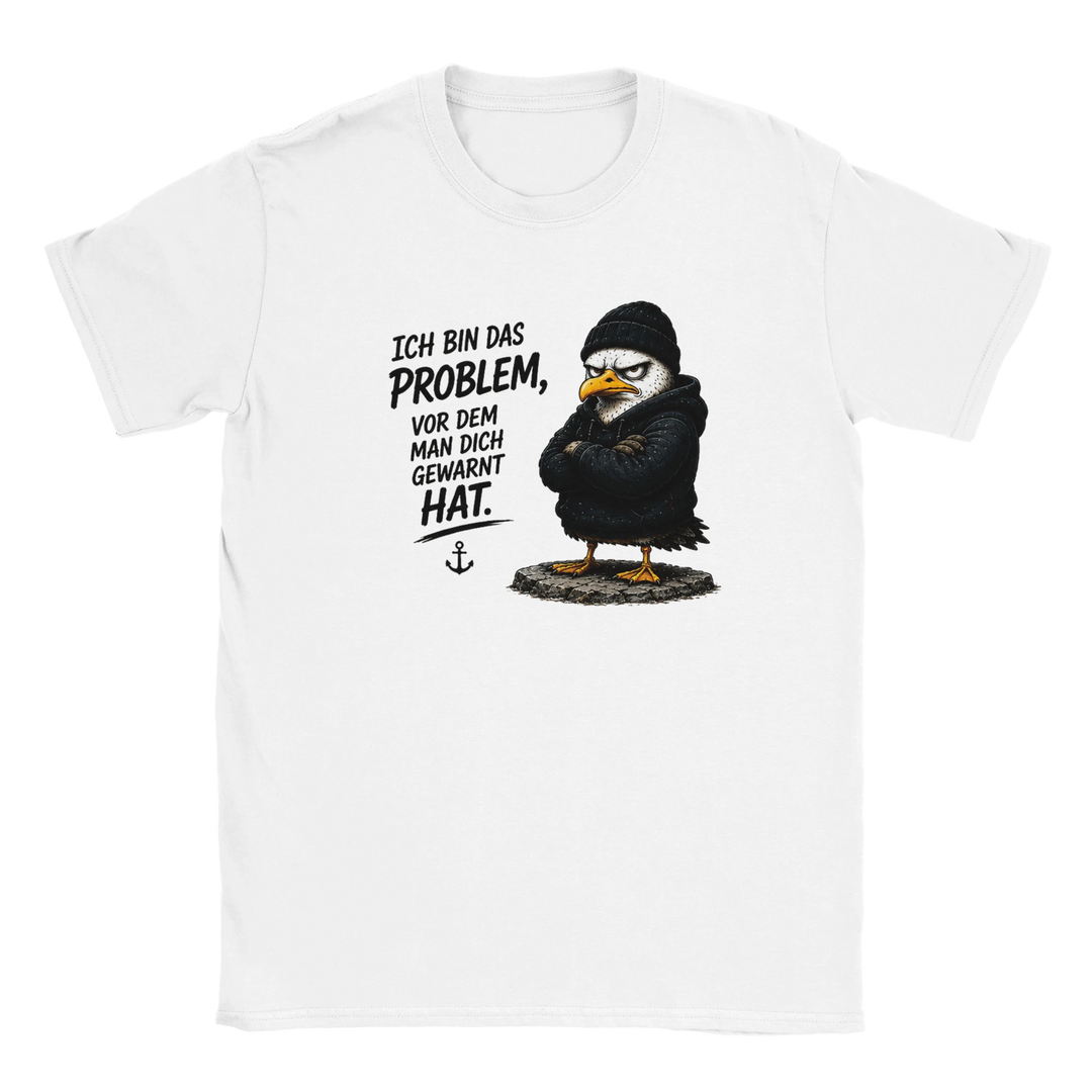 Flatlay des T-Shirts mit vermummtem Vogel und Spruch &